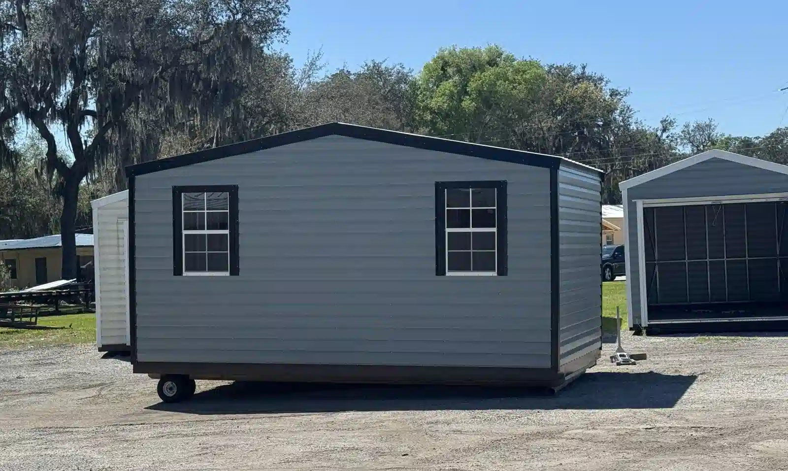 Traditional lofted barn shed with steep roof and upper loft storage - Florida
